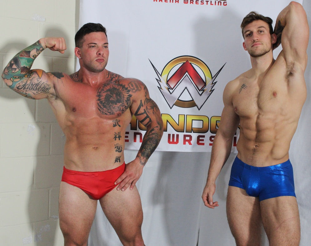 Hero and Cason side by side flexing