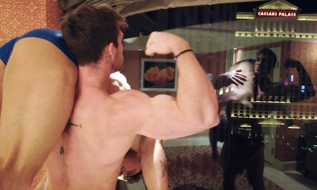 Cason flexing in the window