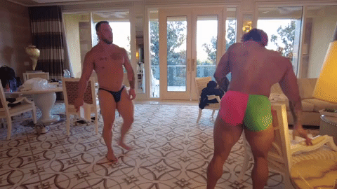 Dom9 hitting Kuma on the head with a book