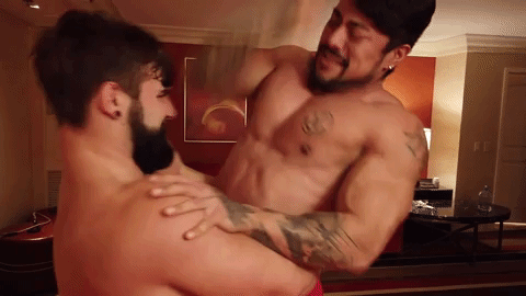 Loki bear hugging Kuma