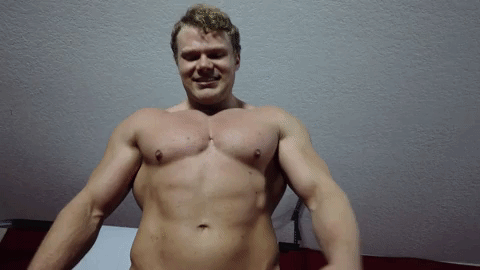 Regan squeezing Ashton89 in a head scissor