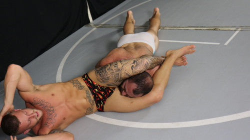 Archer wolf Headscissors submission hold submit pain 