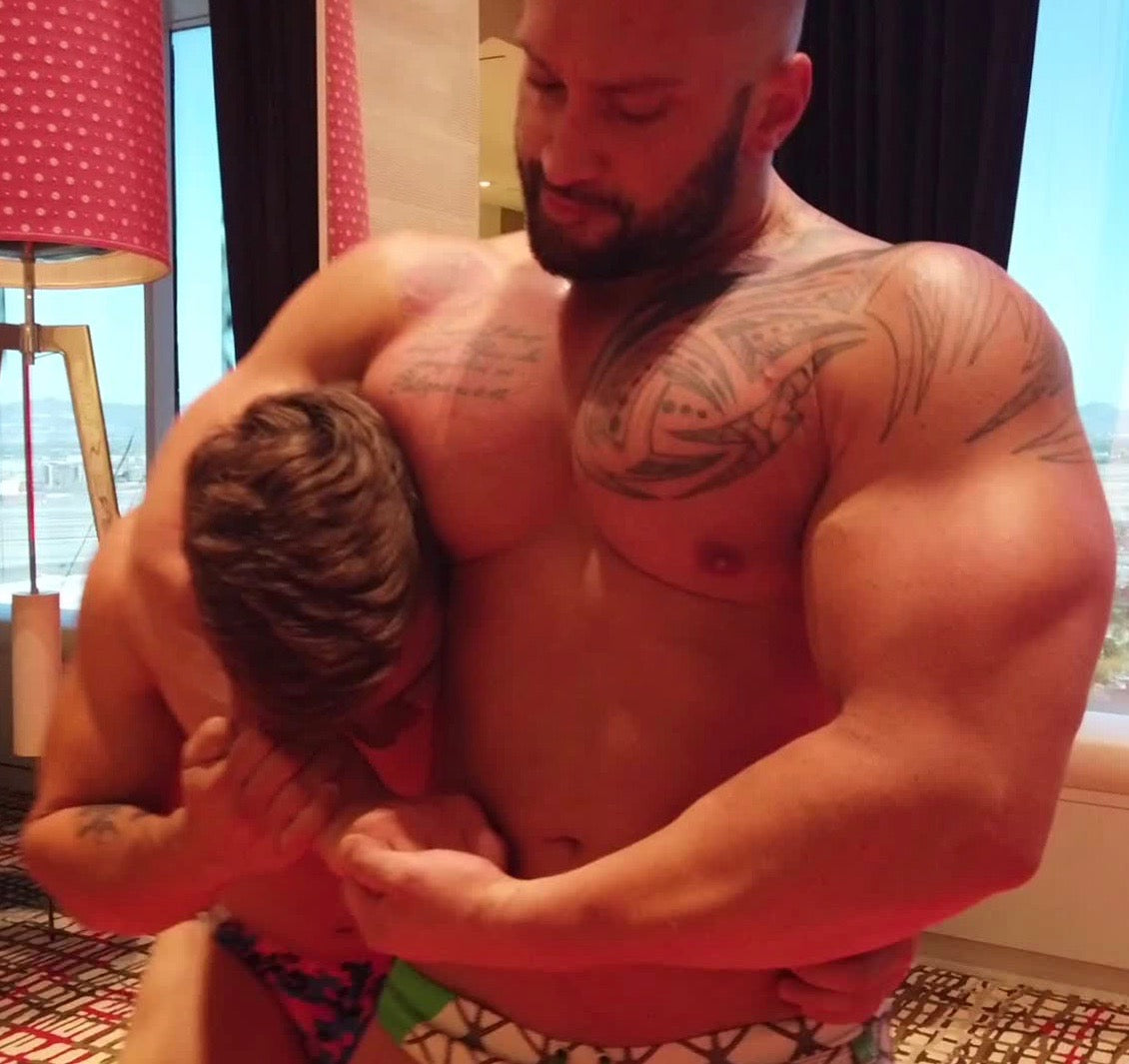 Stallion puts Loki into a headlock at Thunders Arena  Wrestling. 