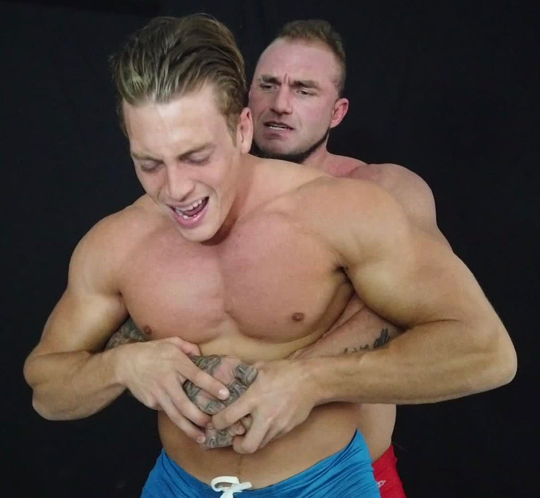 Bull puts Scrappy in a bear hug at Thunders Arena Wrestling. 