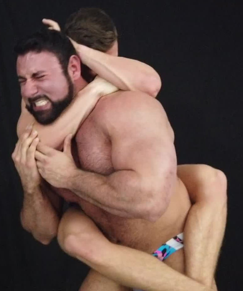 Striker puts Gino into a full nelson at Thunders Arena Wrestling. 