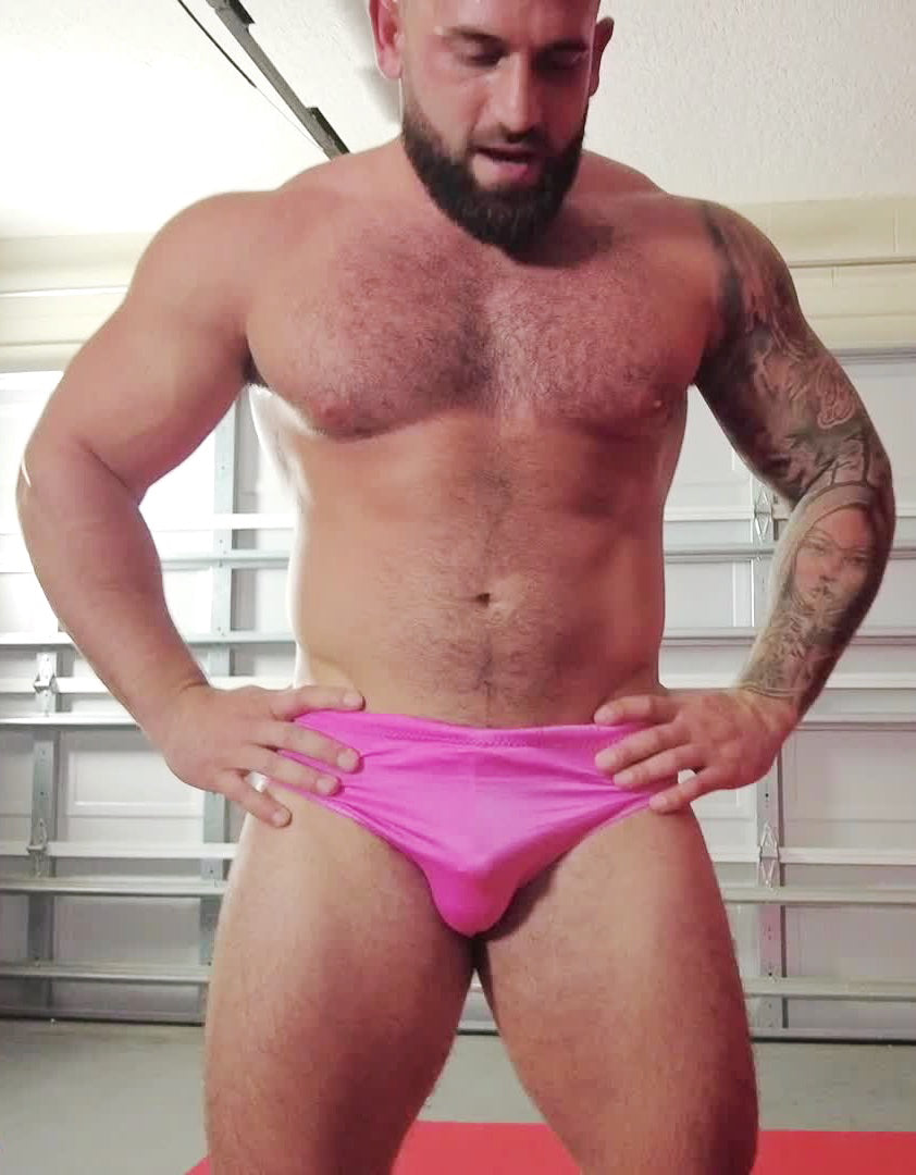 Johnny Greco flexing