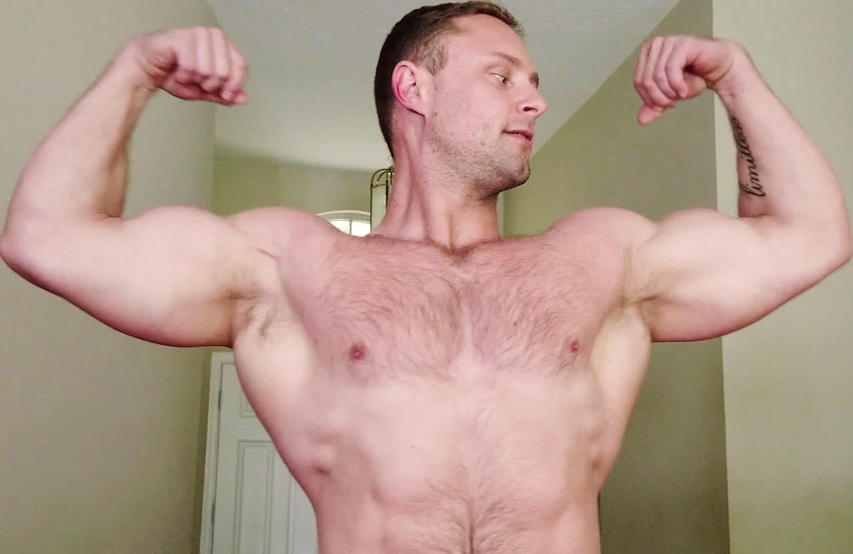 Meaty double bicep flexing