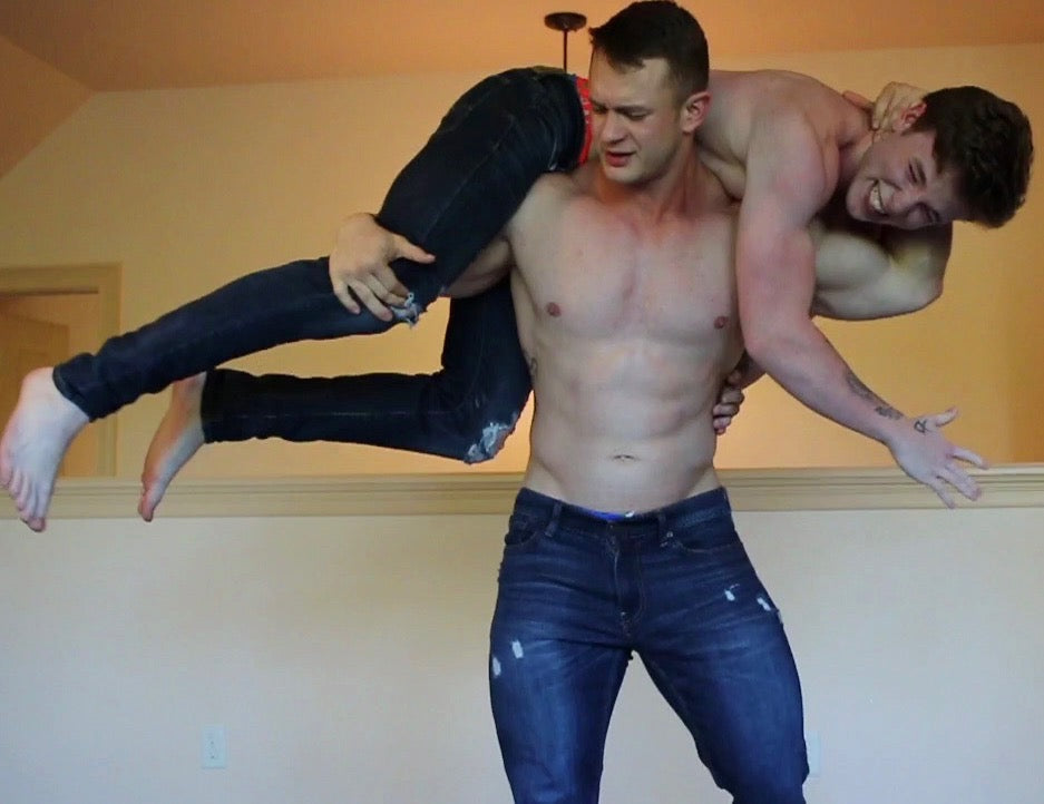 wrestlers over the shoulder carry each other