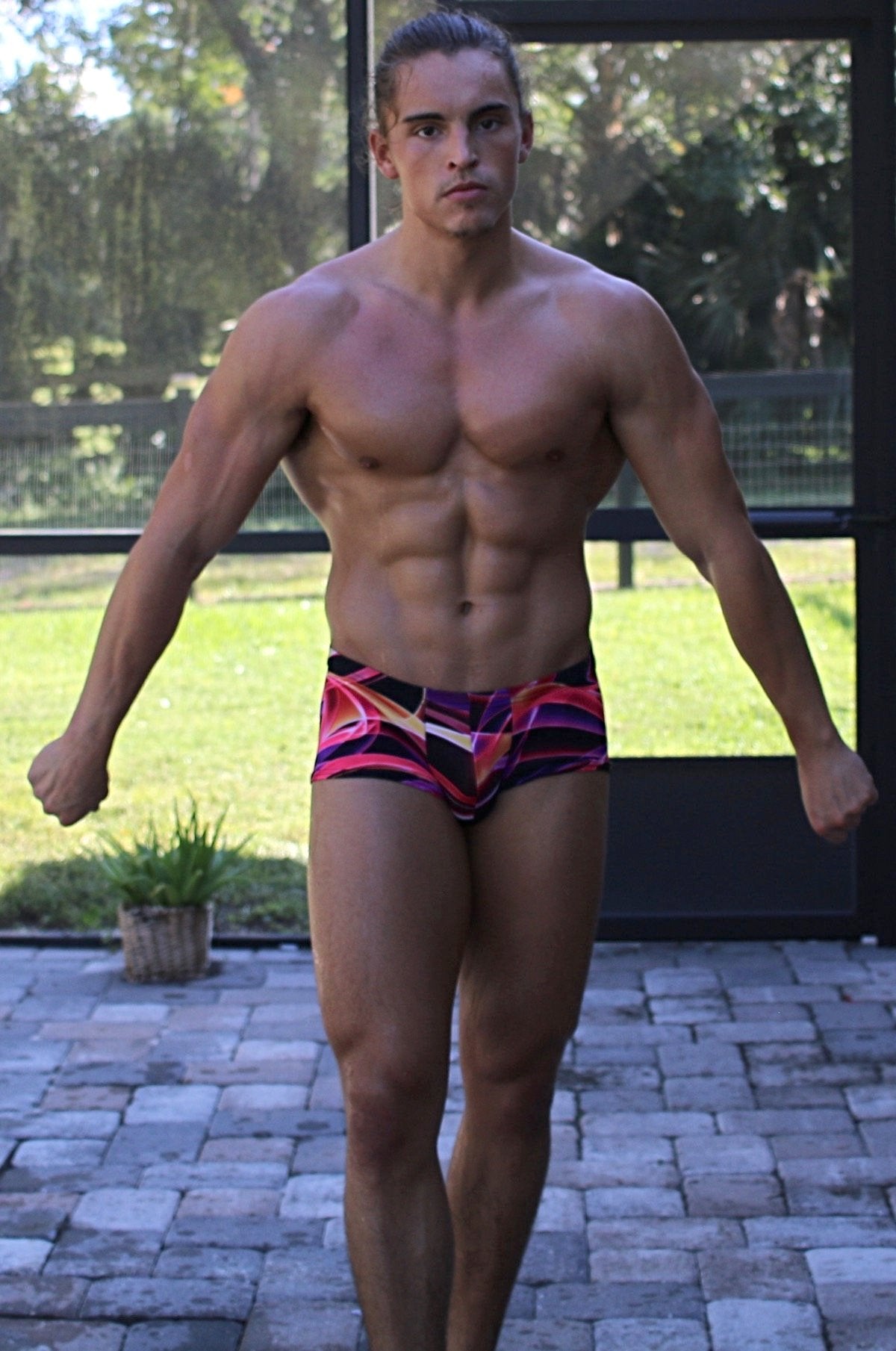 Jack Beaver flexes at Thunders Arena Wrestling. 