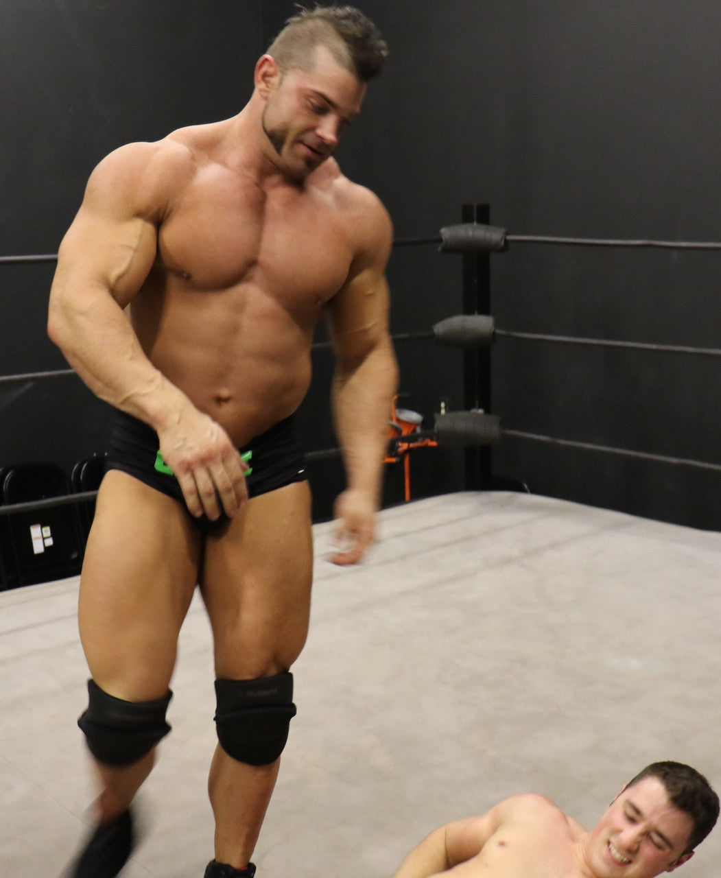 Brian Cage overlooks Bolt big pecs chest huge arms biceps abs muscle worship