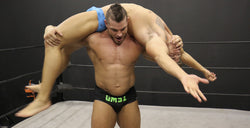 Brian Cage lifts Eagle firemans carry pecs abs