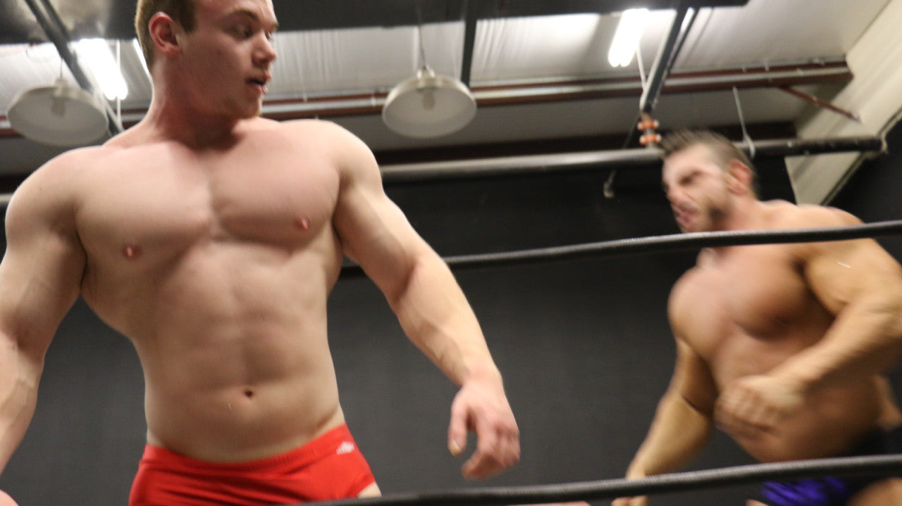 Travis and Brian Cage pose huge pecs abs biceps