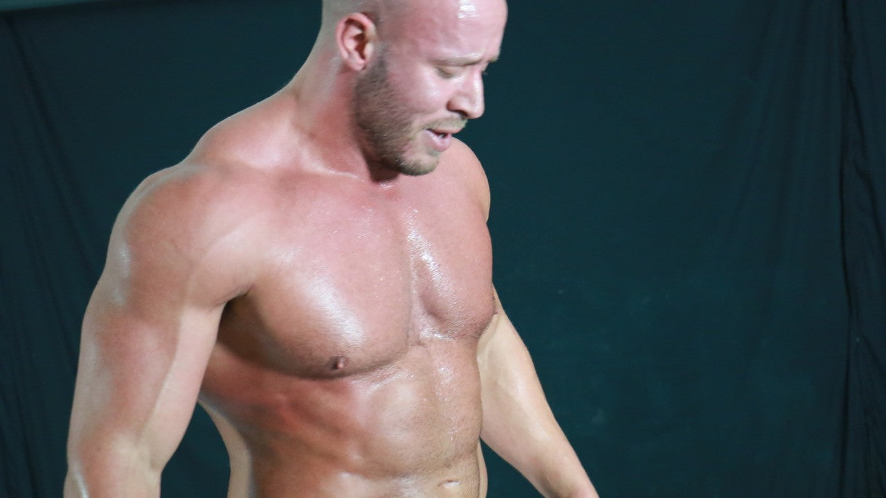 Brute pose huge pecs arms abs