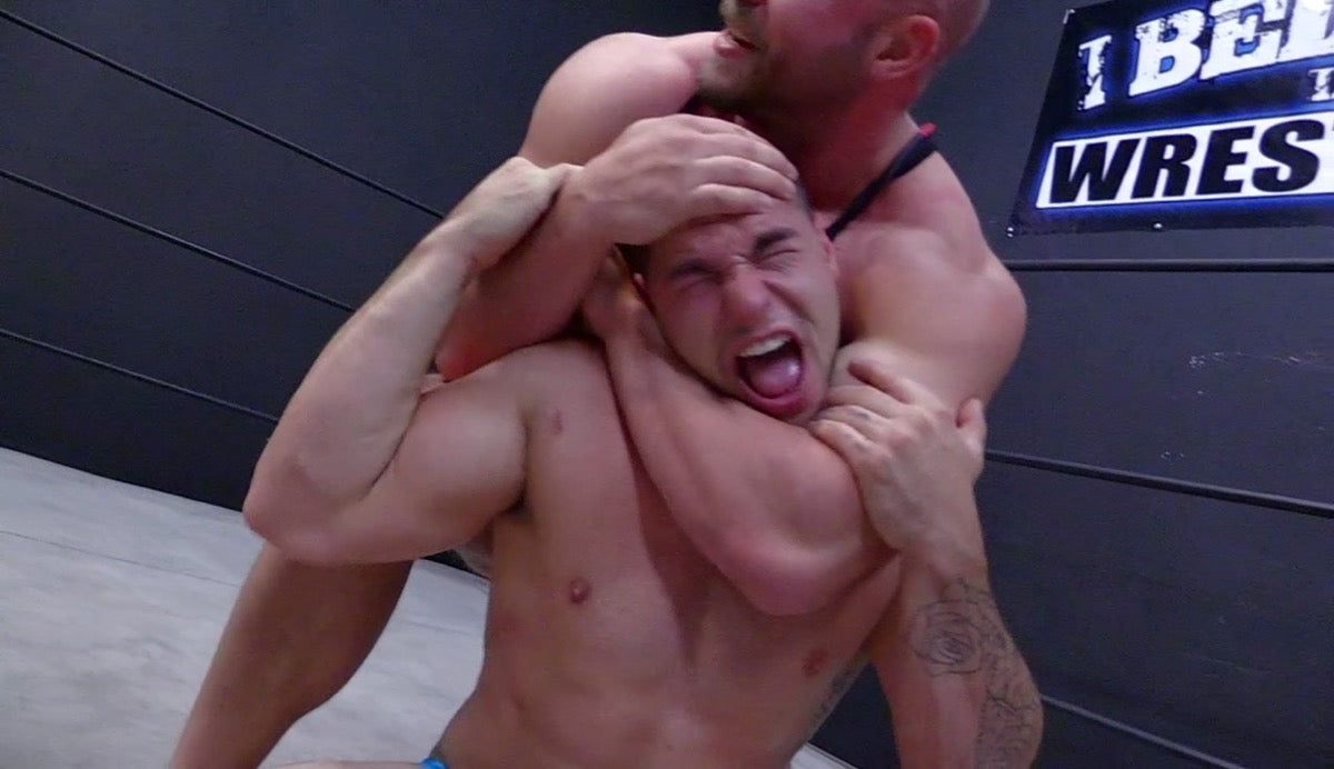 Brute puts Aspen into a sleeper at Thunders Arena Wrestling. 