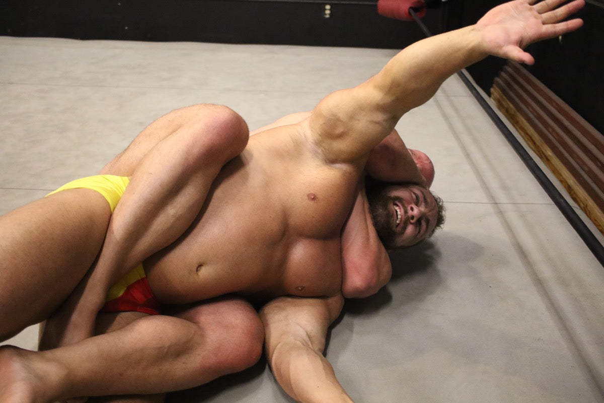muscular men wrestling