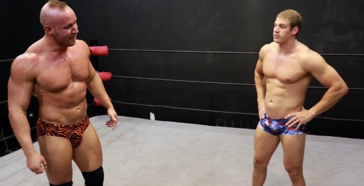 Brute and Viggo size each other up huge pecs abs arms biceps