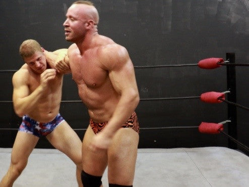 Viggo transitions out of headlock by Brute pecs arms biceps thighs