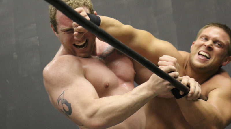 Bucky and Talon get scrappy on the ropes arms chest