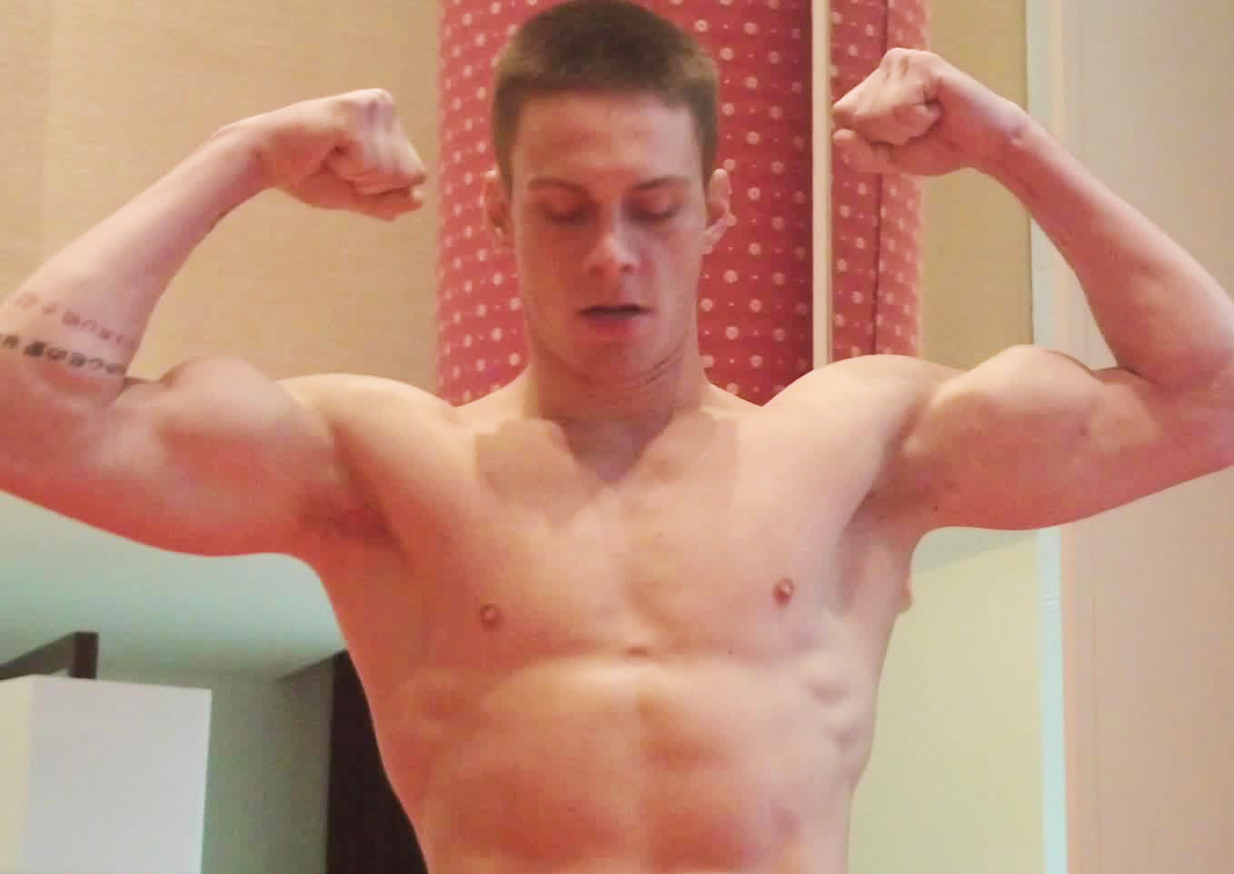 Bronze Bullet double bicep flexing