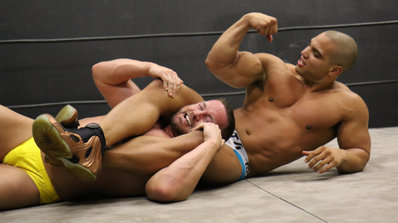 Dozer head scissors Joey King flexing bicep pecs