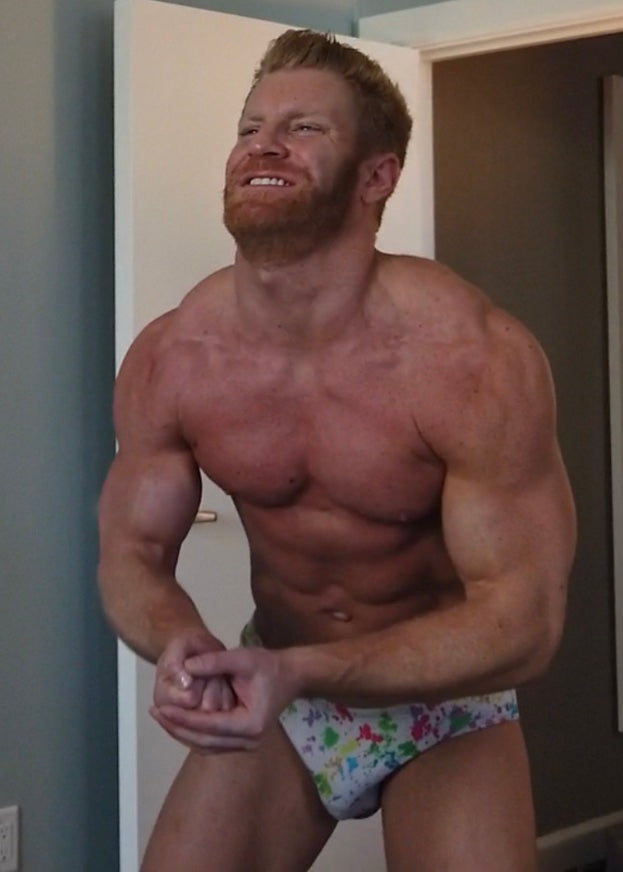 Johnny V flexing mid match