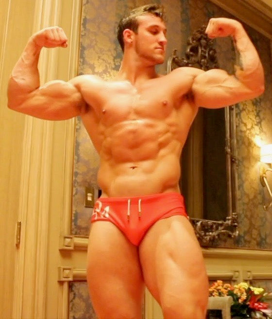 cason flexes for the camera