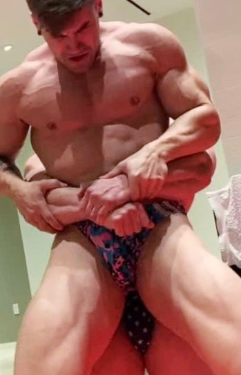 Steel puts Loki into a bearhug at Thunders Arena Wrestling. 