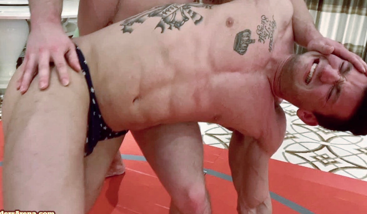 Simpson puts Mercury into an over the knee back breaker at Thunders Arena Wrestling. 