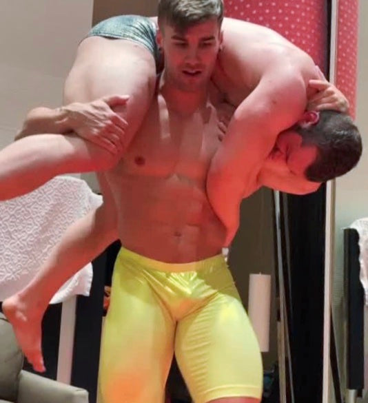 Loki puts Auswell over his shoulders at Thunders Arena Wrestling. 