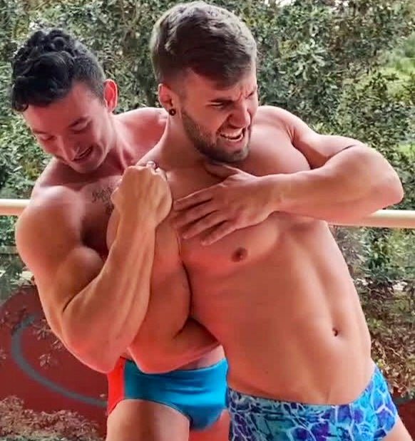 Mercury puts Loki into a chicken wing at Thunders Arena Wrestling. 