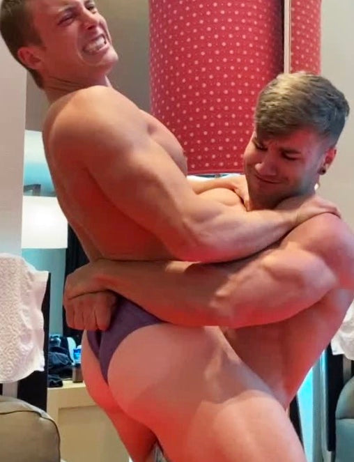 Loki bear hugs Scrappy at Thunders Arena Wrestling.