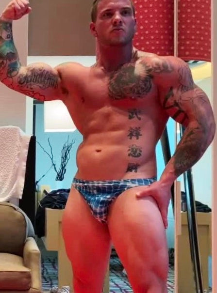 Hero flexes at Thunders Arena Wrestling. 