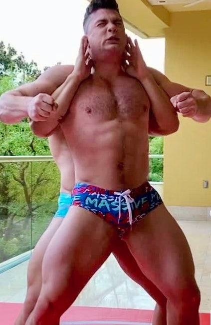 Loki puts Simpson into a full Nelson at Thunders Arena Wrestling. 