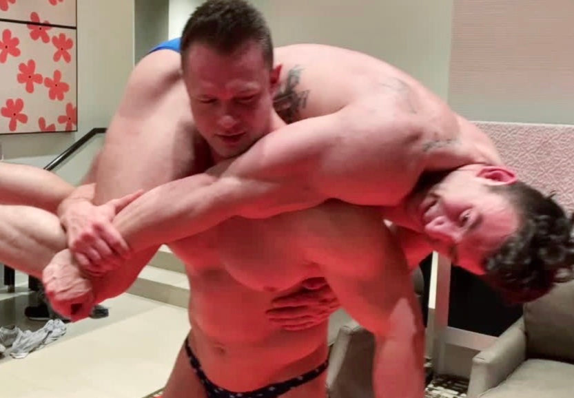 Steel puts Mercury into a fireman’s carry at Thunders Arena Wrestling. 