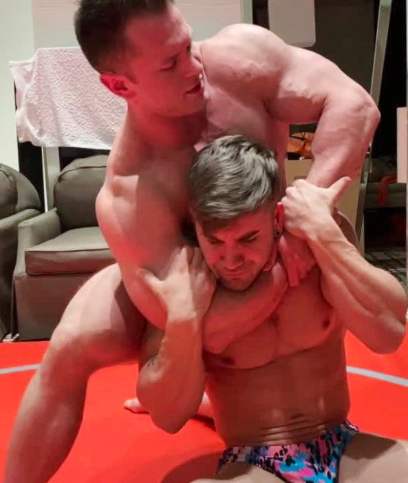 Steel puts Loki into a sleeper at Thunders Arena Wrestling. 