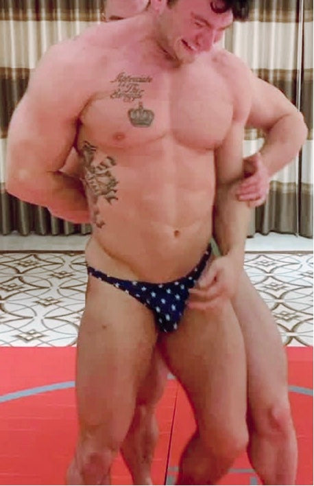 Simpson puts Mercury into an arm bar at Thunders Arena Wrestling.