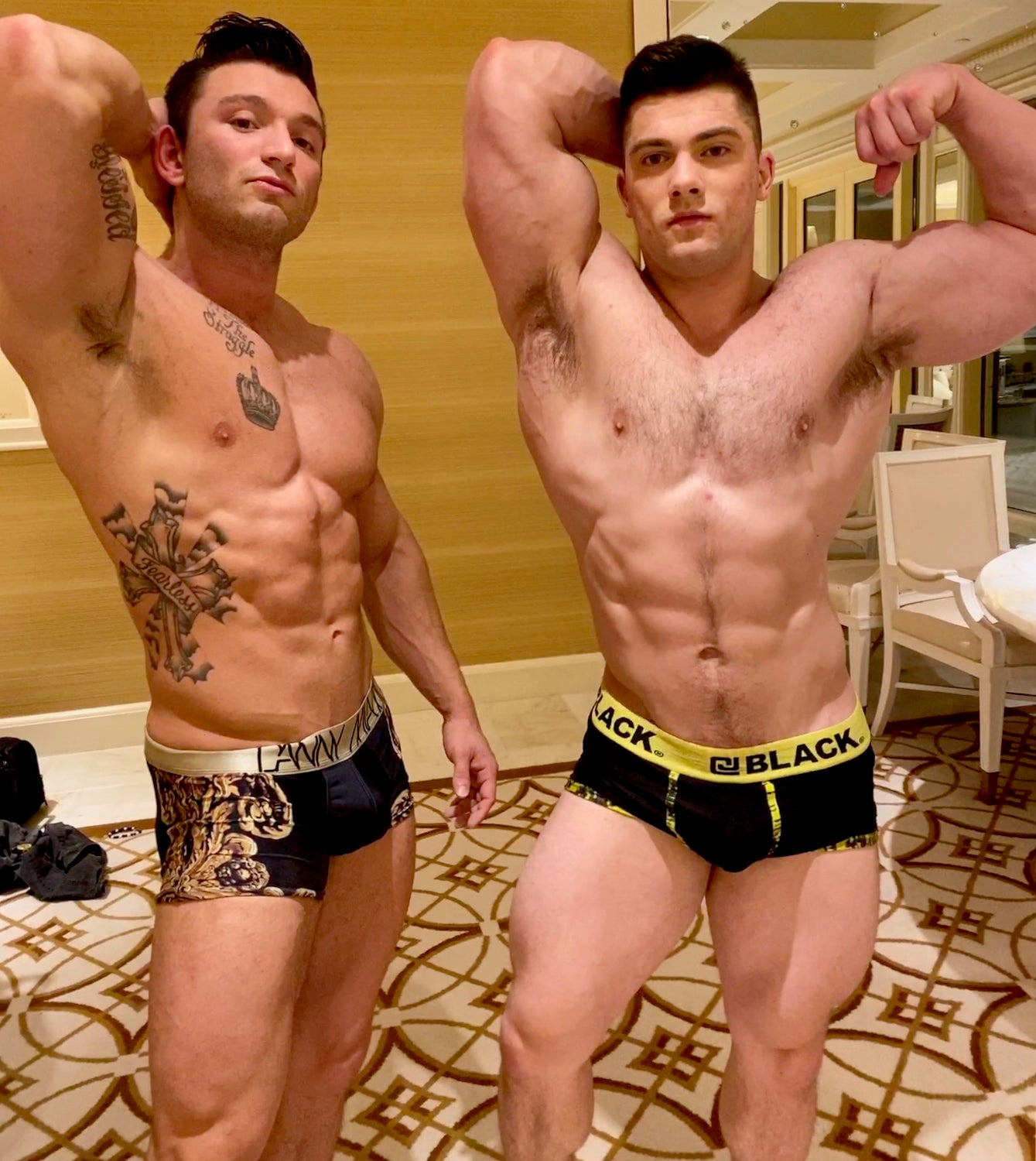 Mercury and Simpson flex their biceps at Thunders Arena Wrestling. 