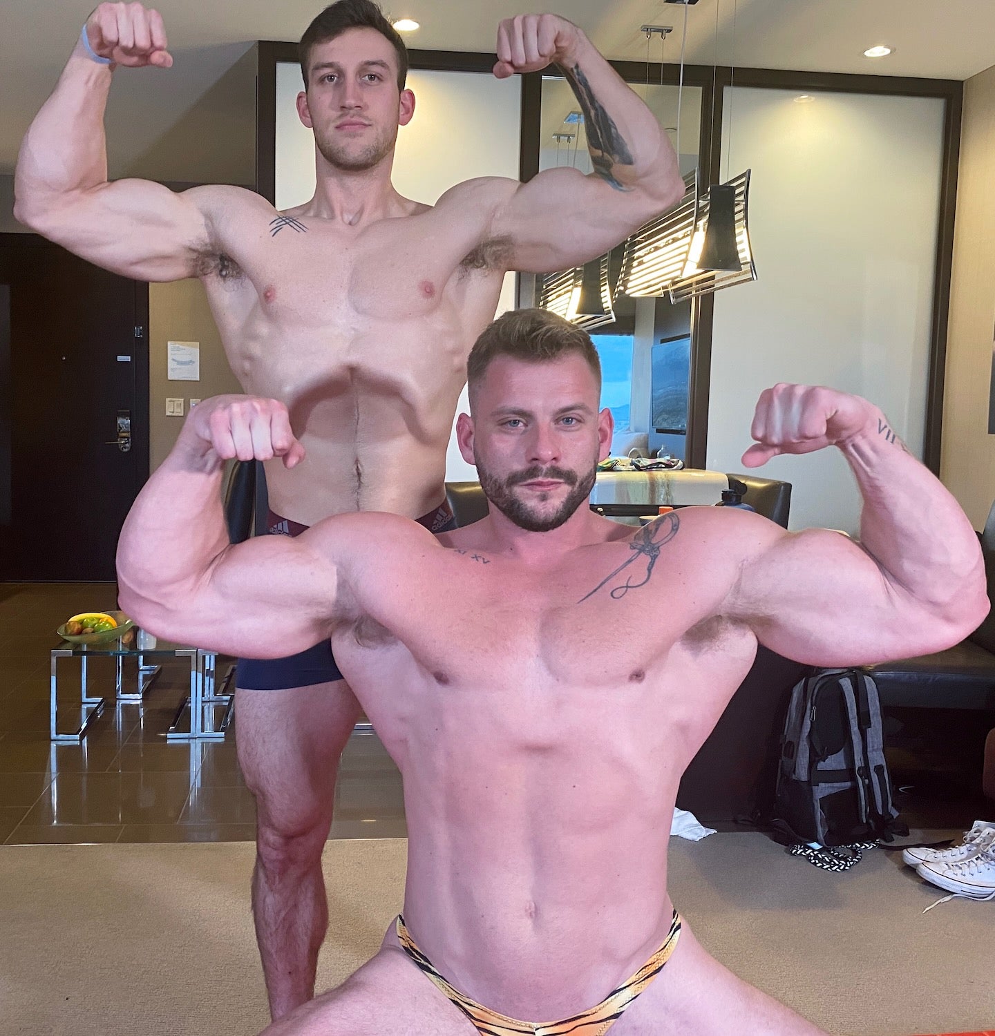 Bodybuilders double bicep flex