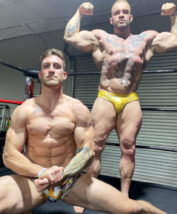 Bodybuilders flexing thunders arena