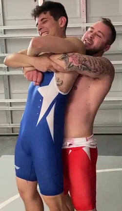 Dom Knight bear hugs Flaco at Thunders Arena Wrestling. 