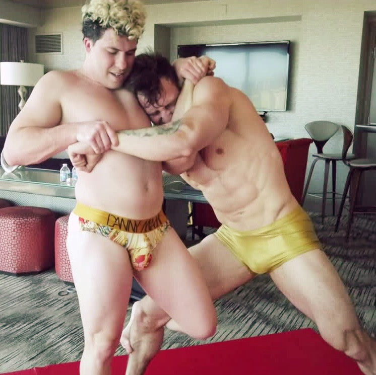 Axel pinning Casons head against his chest