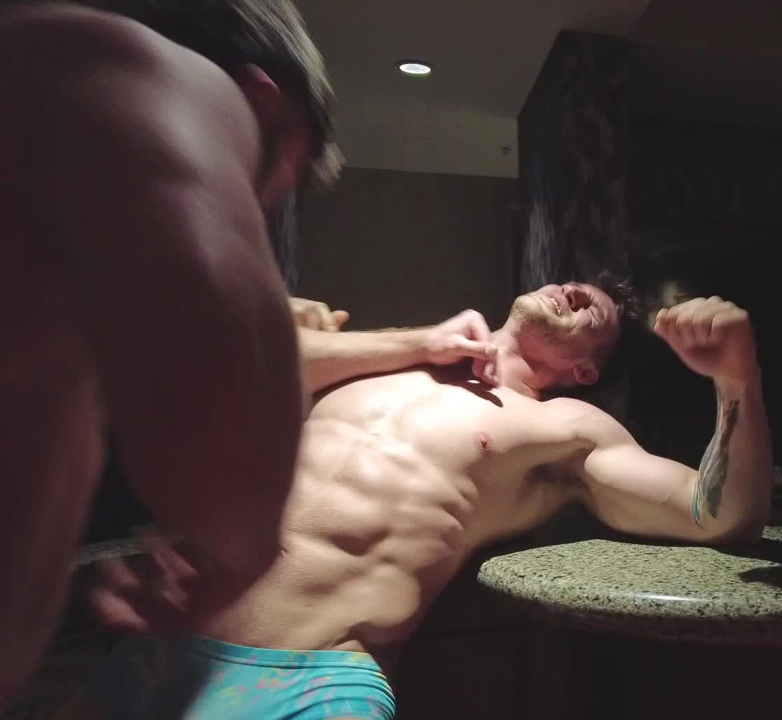 Hellfire pinning Cason against the bar