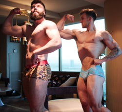 Cason and Hellfire bicep flexing