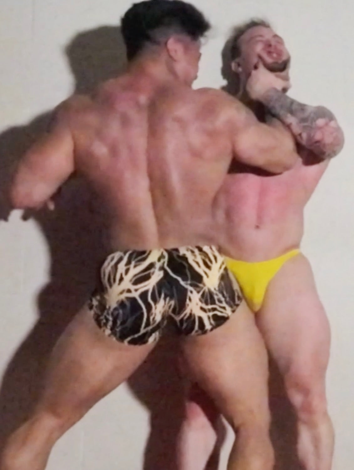 Kuma chokes Dom against wall