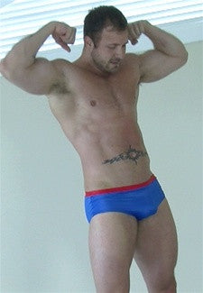 austin wolf flex pose abs arms chest pecs thighs thunders arena