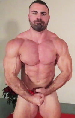 Jacked bodybuilder flexing thunders Arena