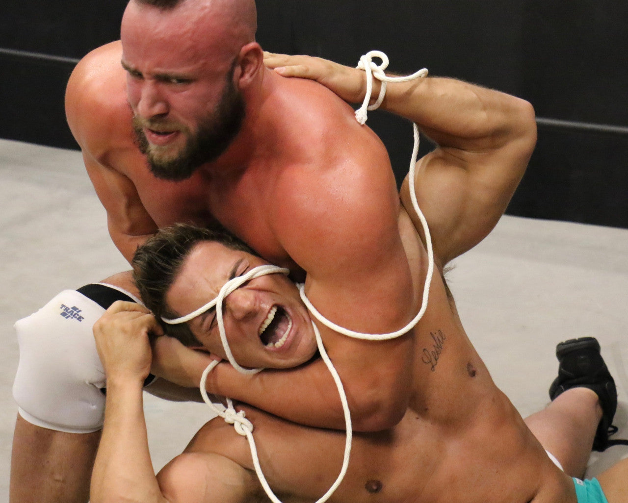 Brute headlocks PeeWee arms pecs