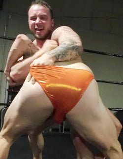 Reaching inside wrestling trunks Thunders Arena