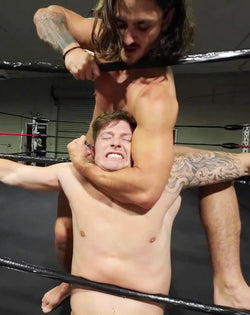 Rear chokehold on ring ropes