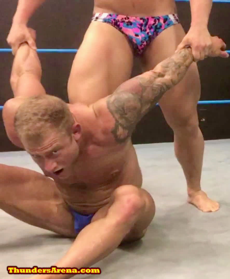 Joey King puts Jake into a back breaker at Thunders Arena Wrestling.